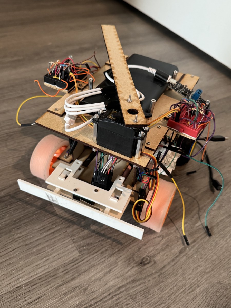 Physical ROBA robot with MDF frame, four-wheel drive, servo mechanism and sensors